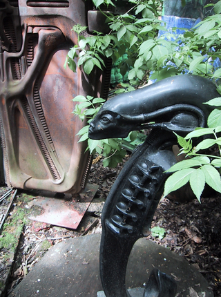 Illustration for article titled Behold The Unearthly Delights Of H.R. Giger's Personal Sculpture Garden